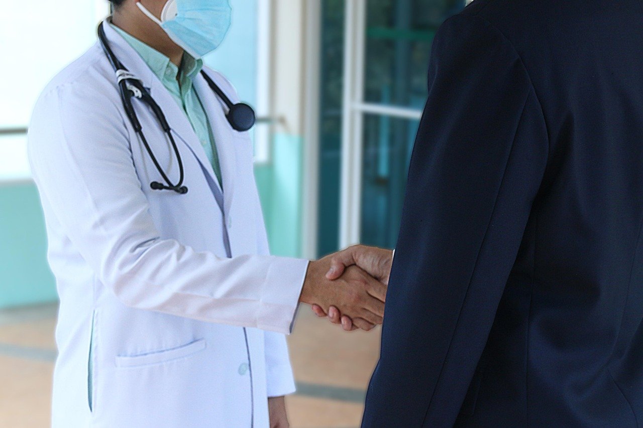 doctor patient handshake 5835367
